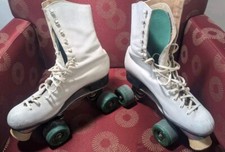 Vtg Riedell 220 leather lined , Sz 7-7 1/2 meta flex wheels are vanathane .   