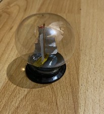 Minature ship in a glass ball ornament,in a box