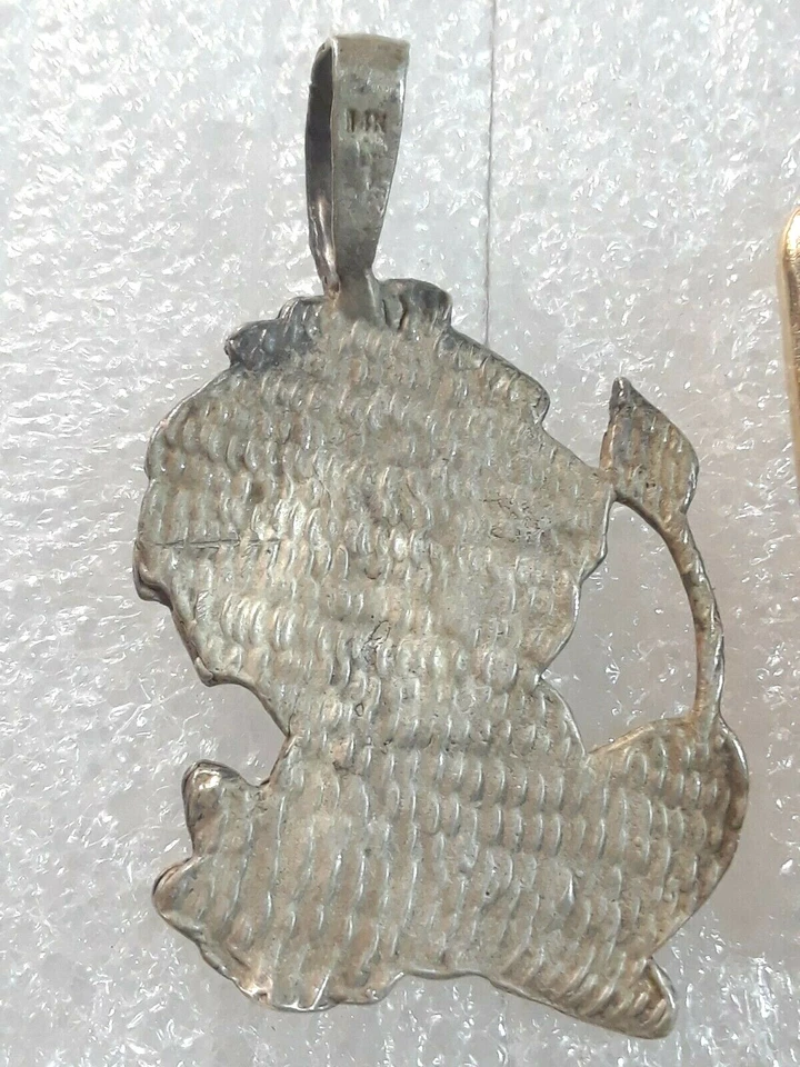 Colgante león, plata, piedras azules, pedrería, piedra ovalada negra, Michael Kors + Foto 3 de 4