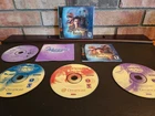 Shenmue - Dreamcast-VG-Complete CIB Manual & Passport - ALL 4 discs Excellent