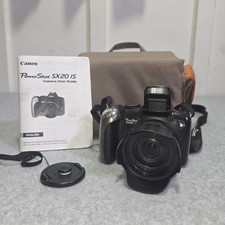 Canon PowerShot SX20 IS 12.1MP 20x Zoom Digital Camera - Flip LCD Bundle Works