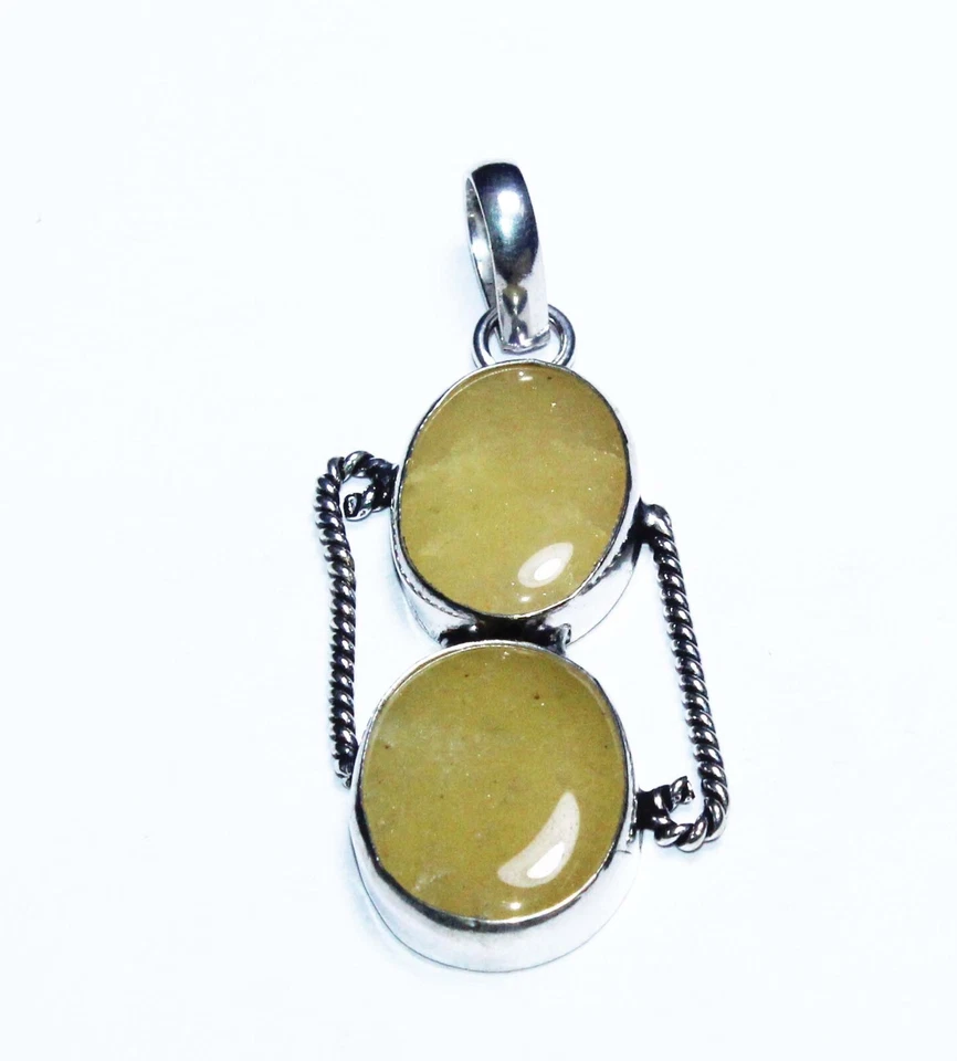 Colgante hecho a mano de piedras preciosas de forma ovalada de calcita tamaño 1,5 pulgadas Foto 3 de 4