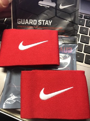 red shin guard stays