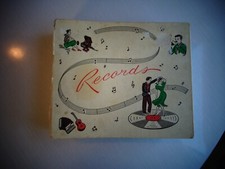24 7" 45 RPM Records with storage book