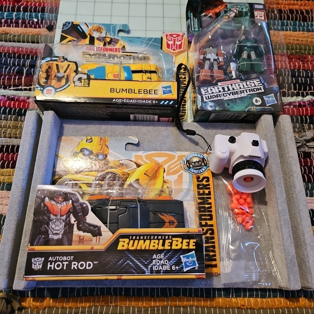 3 New In The Box Transformers and 1 Mini Camera That Shoots 
