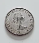 1963 Canada Silver Dollar – 80% Silver – Voyageur Canoe – Circulated