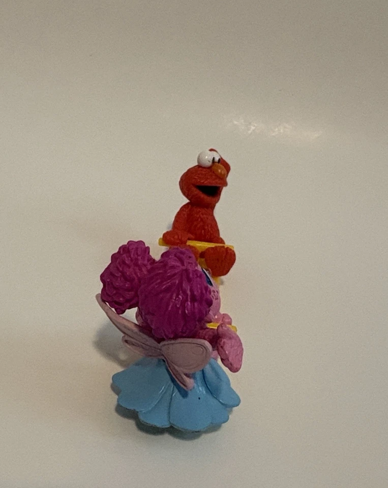 Taller de sésamo panadería artesanías Elmo Zoe Teeter Totter ver-sierra figura tapa de pastel Foto 3 de 4