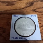 1987 Canadian John Davis. 500 Silver Dollar Coin
