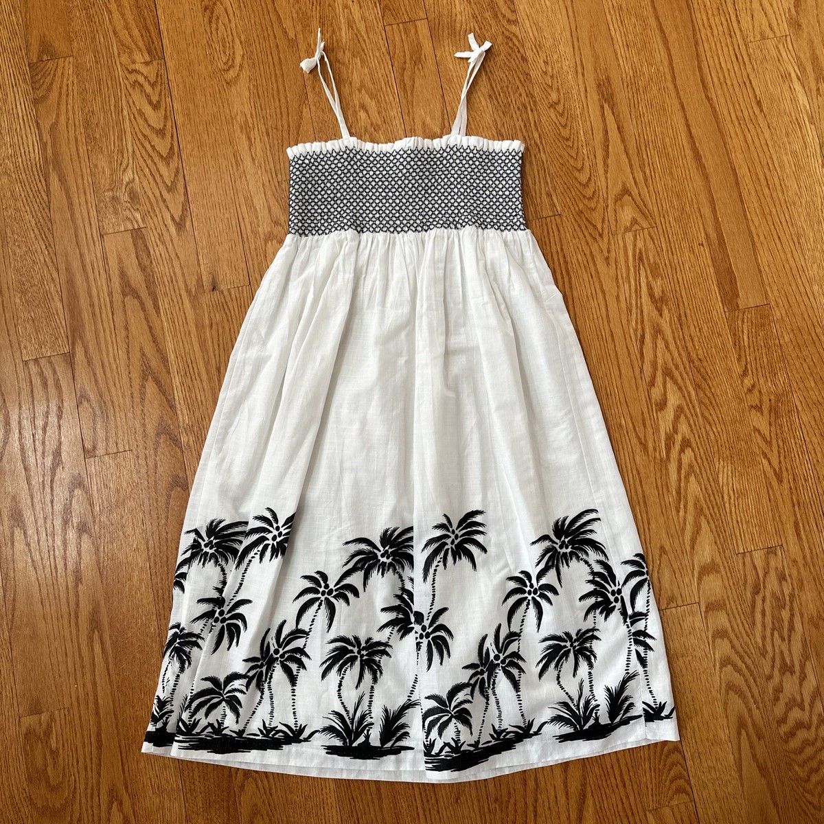 black dress and cream shoes Boden Women's Zara Cross Waist Jersey Dress in Green main image 0