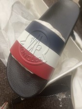Moncler Slides Brand New With Box. Size 40