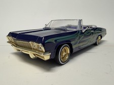 Hot Wheels Lowrider Magazine 118 Scale Purple Gold 1965 Chevy Impala Hot Wheels Lowrider Magazine 118 Scale Purple Gold 1965 Chevy Impala