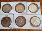 franklin half dollars and one walking liberty half dollar looks like extra fine