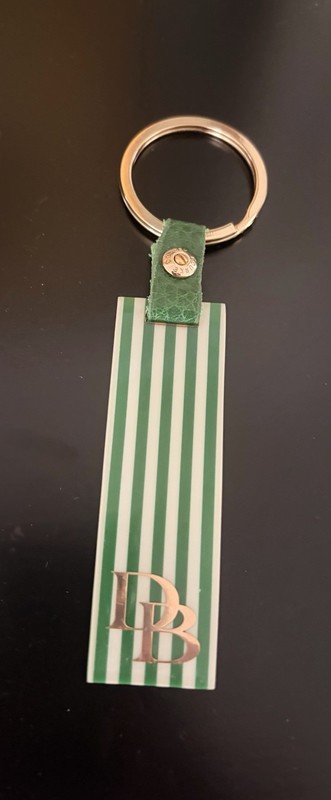 DOONEY BOURKE GREEN AND WHITE STRIPED KEYCHAIN 