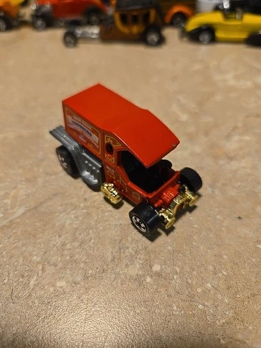 Vintage Hot Wheels T-Totaller (1976)  Red w/ Gold Chrome Base  Flying Colors.