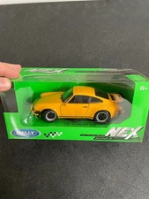 1974 Porsche 911 Turbo Diecast Model Car: 1/24 Scale, New In Box By Welly
