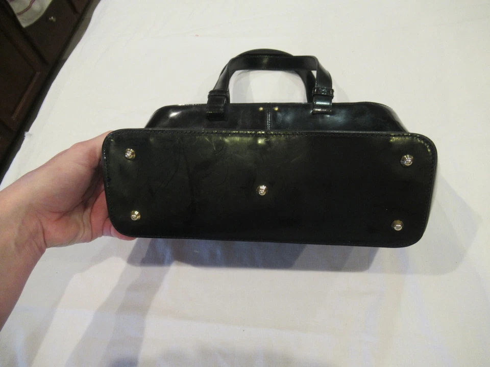 Monedero Jaeger de cuero negro con asa superior, hecho en Italia Foto 2 de 4