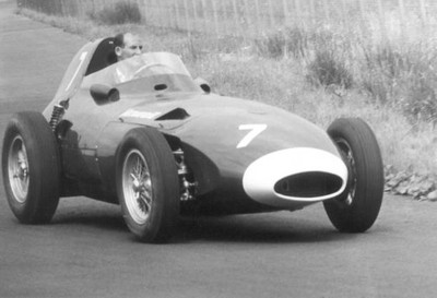 The English racing driver Stirling Moss in his Vanwall during prac- Old Photo
