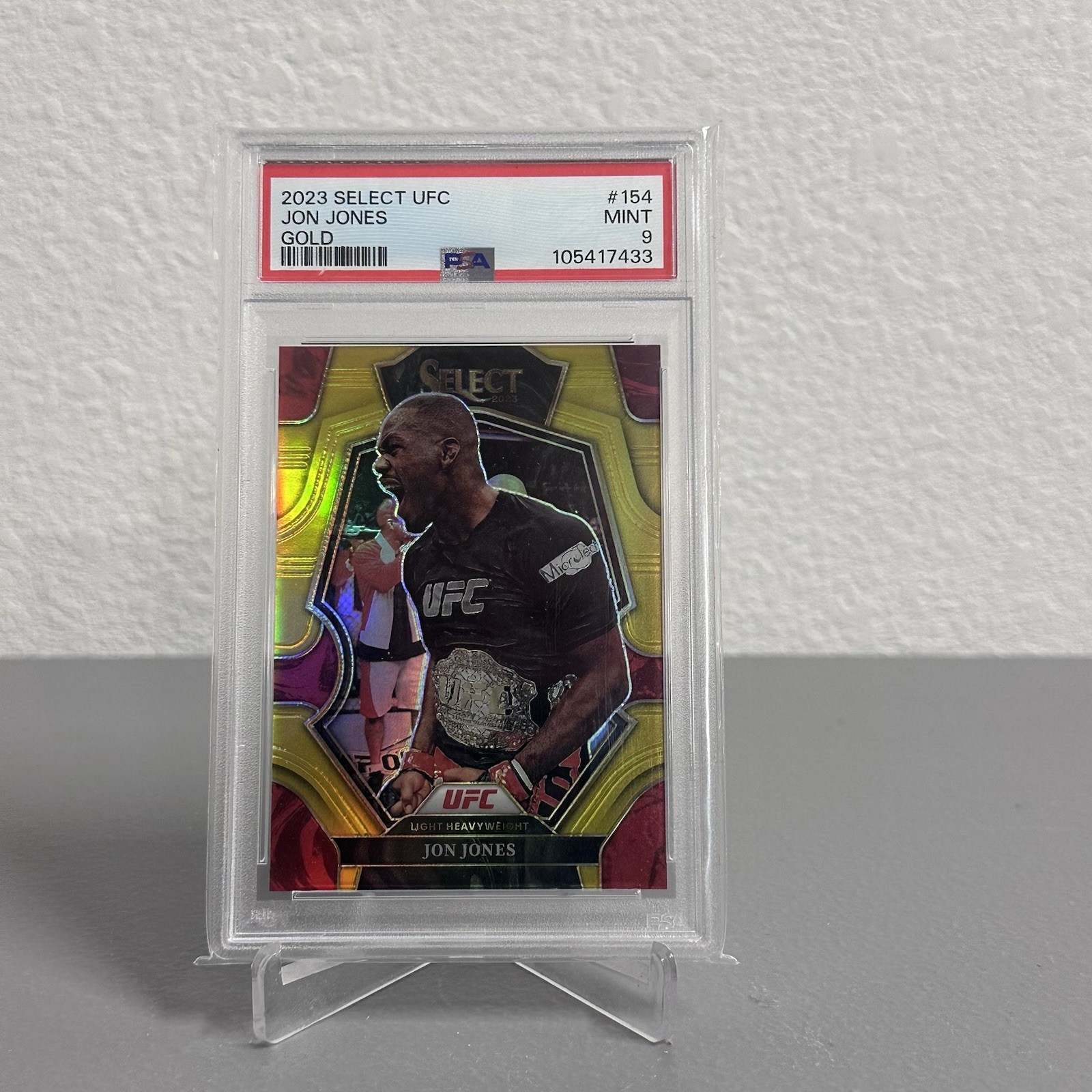 2023 Panini Select UFC Jon Jones Premier Level /10 Gold Prizm PSA 9 MINT view 1