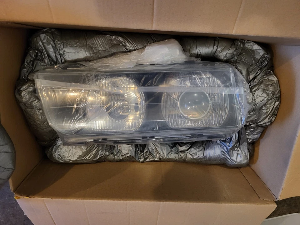 Faro halógeno derecho BMW 740i E38 0302469002 ¡Nuevo en caja! Foto 4 de 4