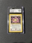 CGC 8.5 NM/MINT+ Team Rocket's Meowth Black Star Promo 18 Pokemon League