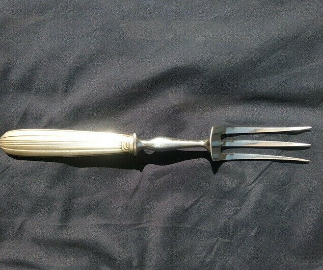 Couvert à gigot en métal argenté
