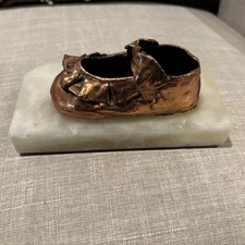 Copper Vintage Baby Shoe Mounted On Stone