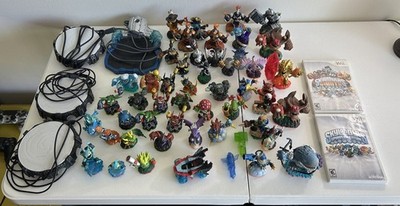 Skylanders Set of 48  (Spyros Adventure + Giants) + 6 Portals + 2 Wii Games