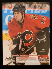 2003-04 RHETT WARRENER  CALGARY FLAMES NHL PROGRAM INSERT COLLECTOR PHOTO #16