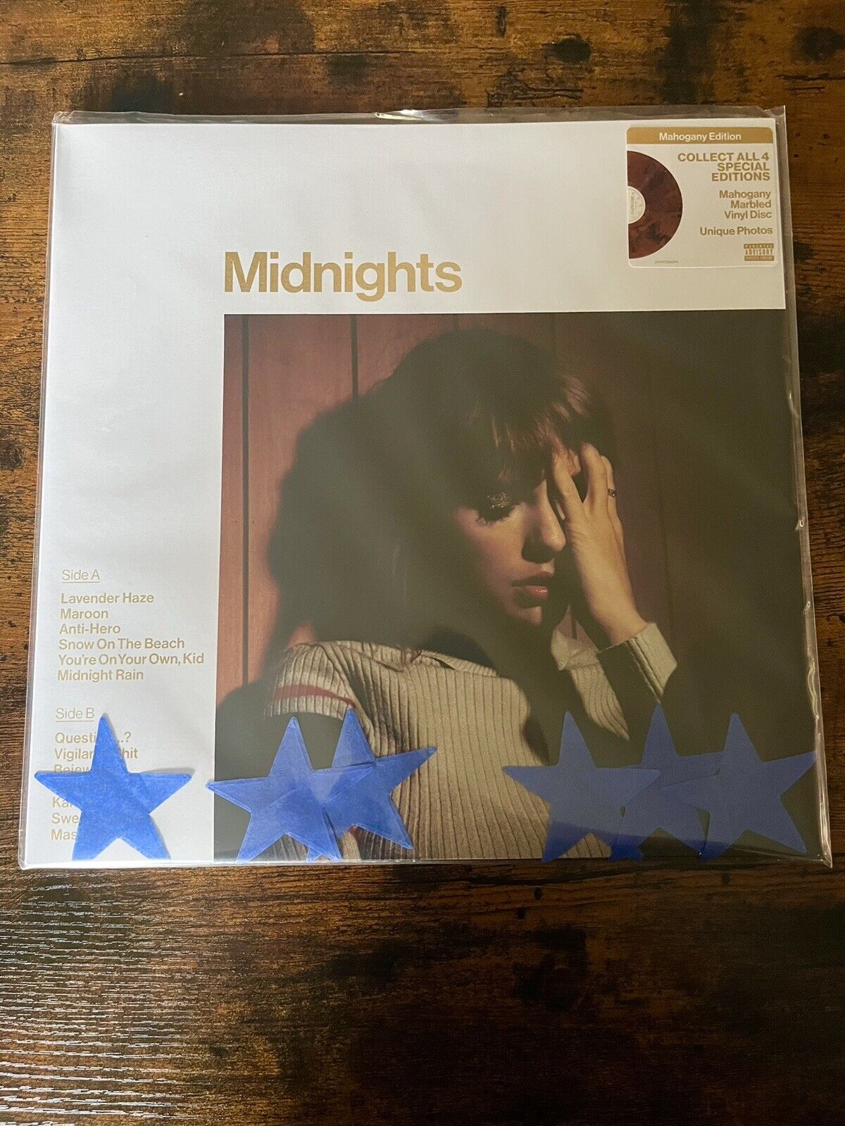 Taylor Swift Midnights Records with packaging stars