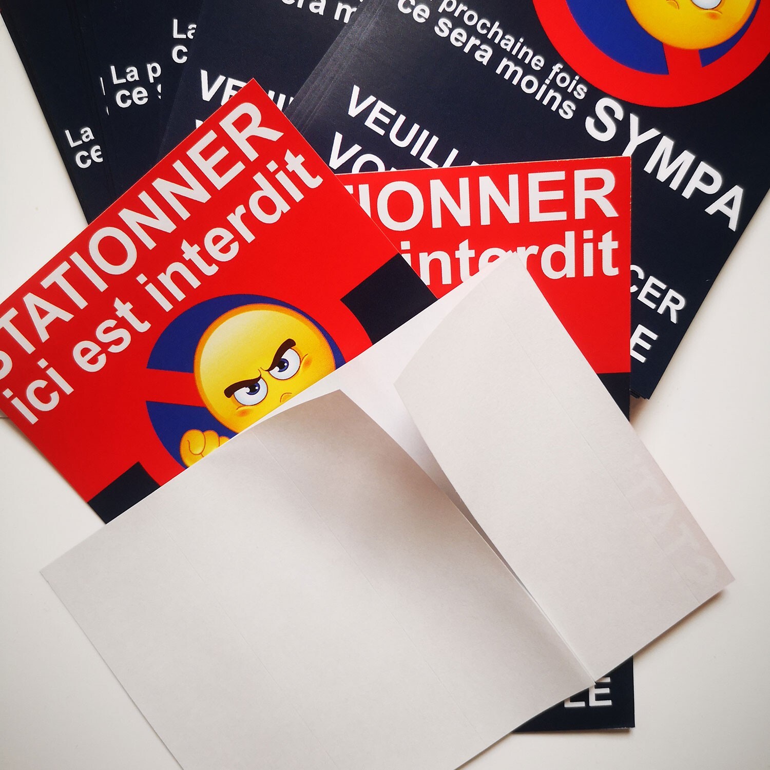 Parking prohibited stickers. Sold in lot of 25 copies.