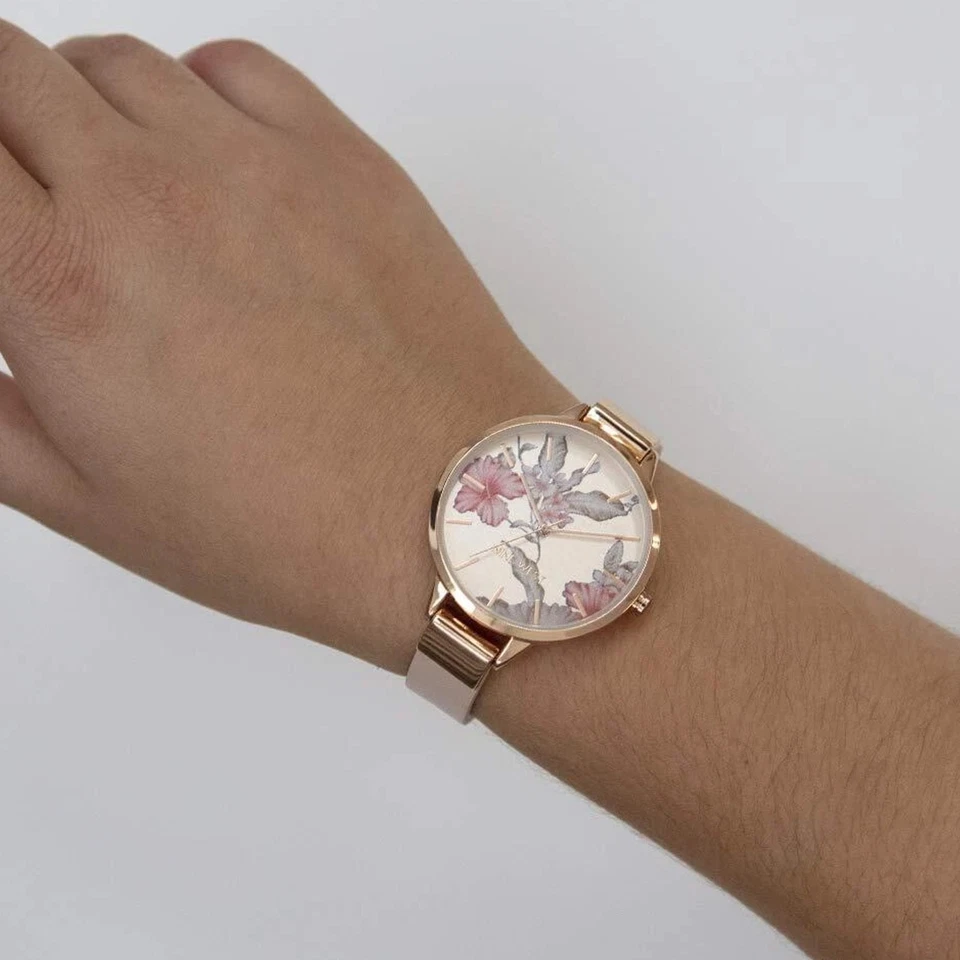 Reloj para mujer Nine West esfera floral correa de cuero 36 mm, rosa Foto 3 de 4