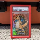 1999 Pokemon Topps First Movie #E12 Dragonite Rainbow Foil CGC 9