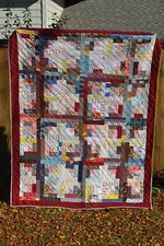 Log cabin style quilt; scrappy variety of quality designer fabrics
