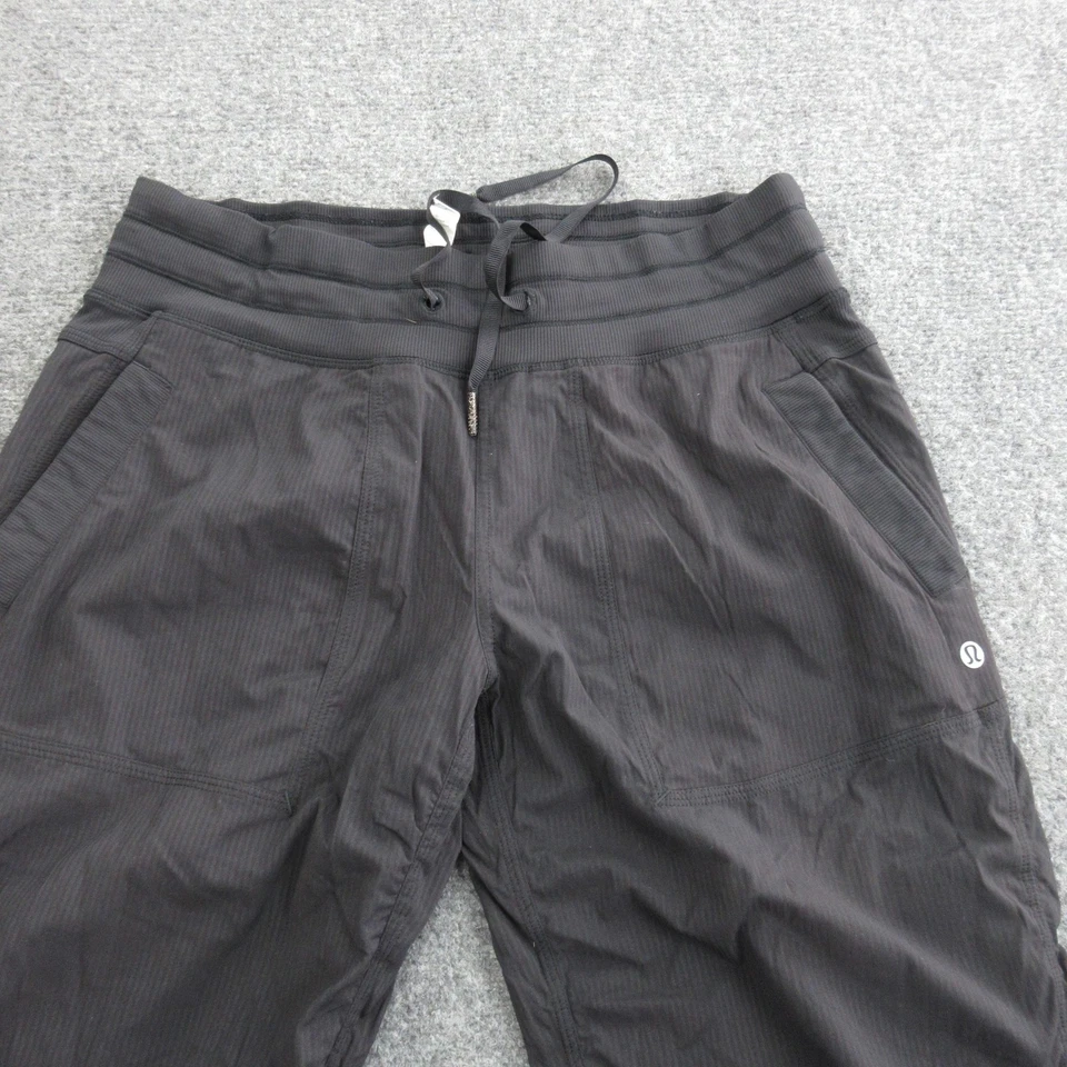 Pantalones deportivos informales Lululemon para mujer 8 negros de estudio de nailon dobladillo ceñido Foto 3 de 4