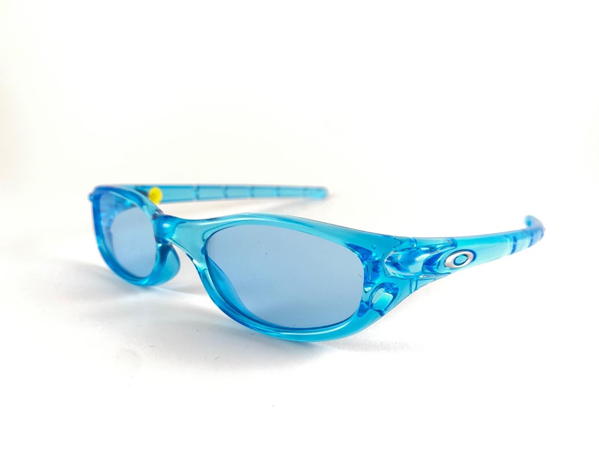 NEW VINTAGE OAKLEY FATE LIGHT BLUE WRAP AROUND SPORTS 1990'S NEW VINTAGE OAKLEY FATE LIGHT BLUE WRAP AROUND SPORTS 1990'S
