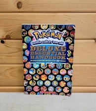 Pokémon Deluxe Essential Handbook 2015 1st Edition Printing