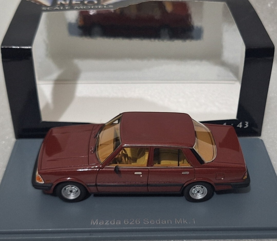 Mazda 626 MKI Sedan 4-Door 1980 Bordeaux 1:43 Neo 44010 Resin