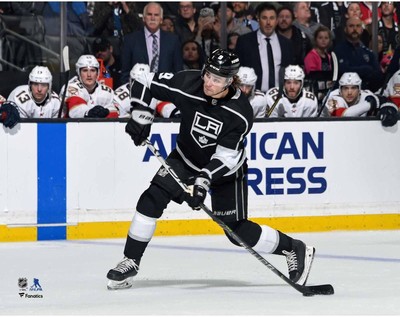 Adrian Kempe Los Angeles Kings Unsigned Shoot Puck vs Panthers Photo