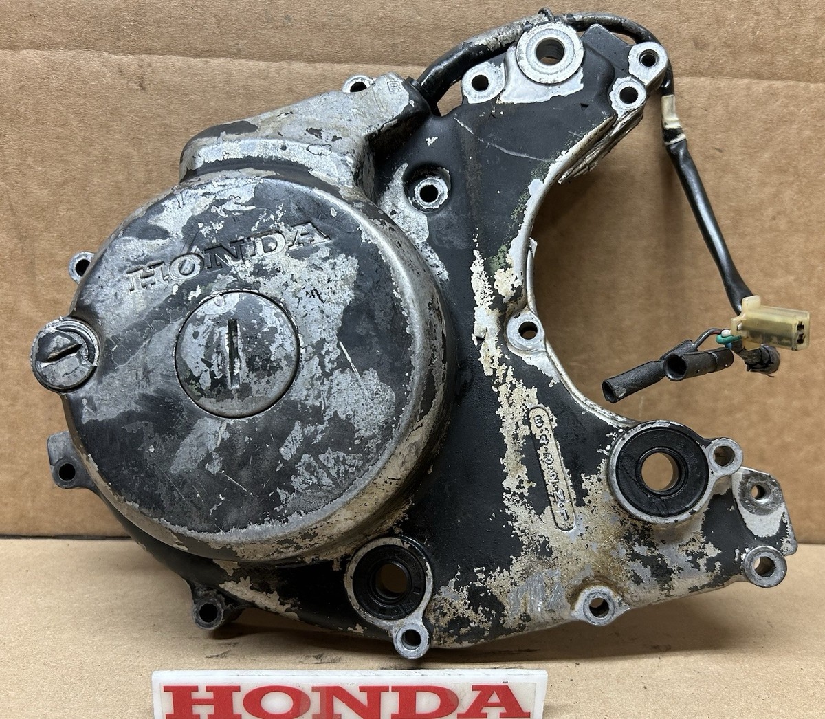 パーツ hanachirokun 87-92 GENUINE HONDA 250X Stator Cover Left Side Crankcase Cover