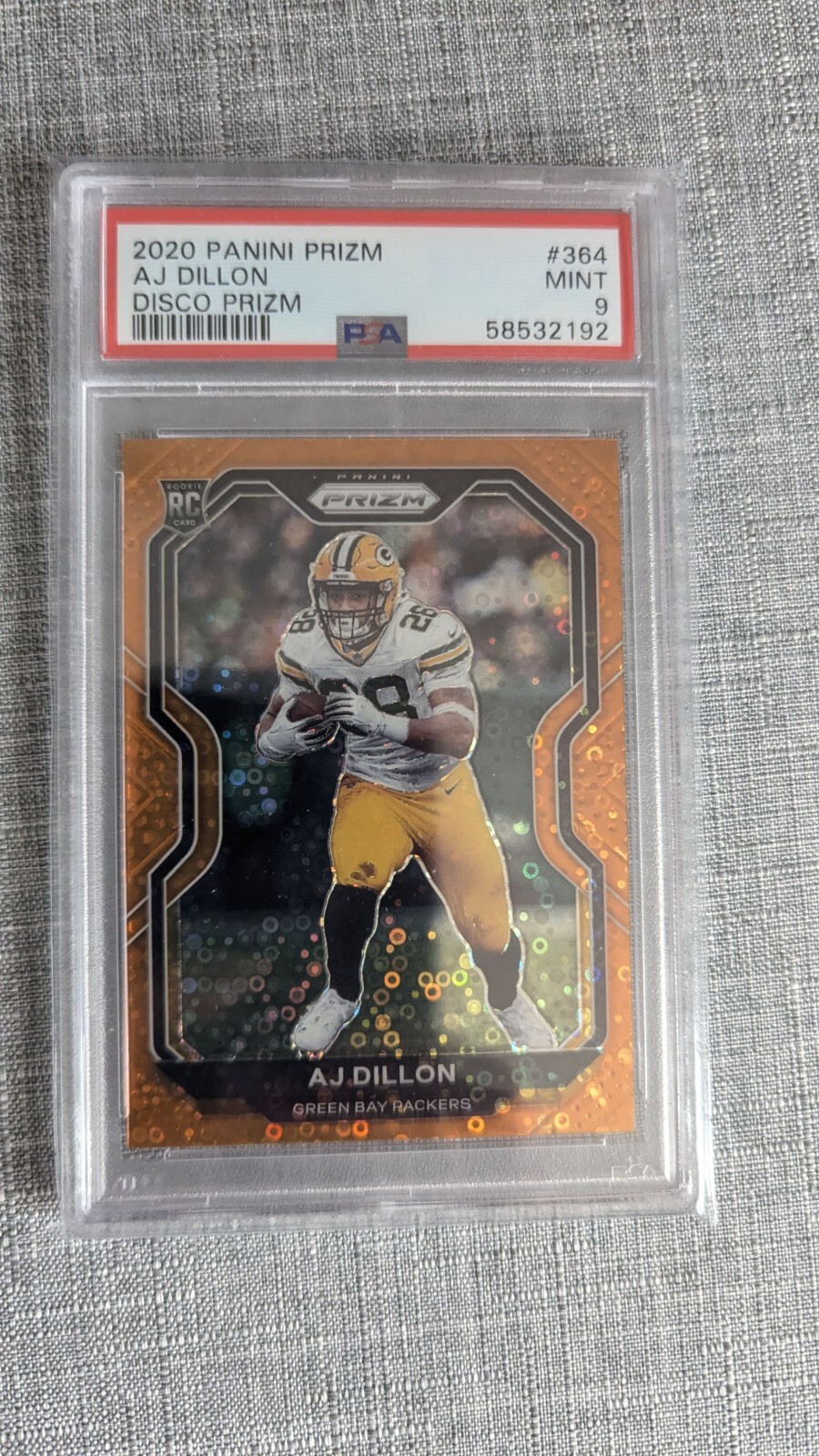 2020 Panini Prizm - Rookie Orange Disco Prizm #364 AJ Dillon (RC) PSA 9