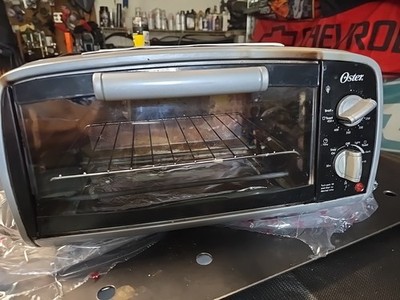 Oster Toaster Oven, 4 Slice, Black (TSSTTVVG01)