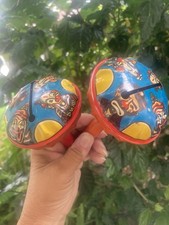Vintage Pair Of CLOWN Tin Litho Noisemaker Party Rattles RED BLUE YELLOW