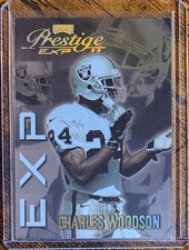 Charles Woodson #416/1000 1999 Playoff Prestige EXP Reflections Gold #EX103