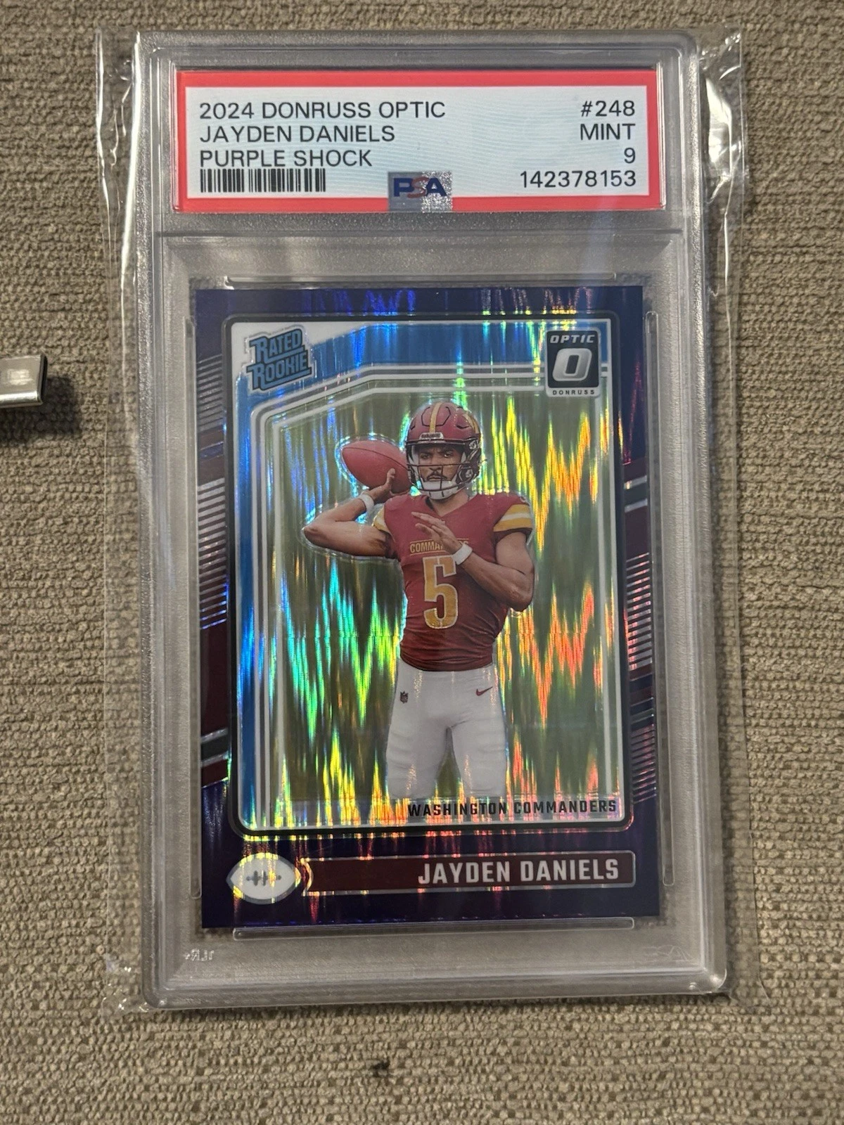 Deal for 2024 PANINI DONRUSS OPTIC PURPLE SHOCK #248 JAYDEN DANIELS ROOKIE RC PSA 9
