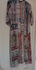 Boohoo Small Holiday Wrap in very good condition.