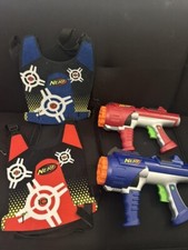 PRE OWNED NERF DART TAG SET BLUE RED NERF GUNS WITH 2 VESTS NO BULLETS 2005
