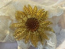 Spilla vintage tono oro firmata Sarah Coventry bigiotteria americana firmata