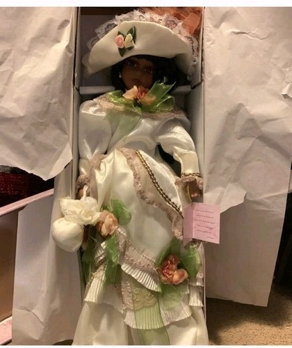 Vintage Porcelain Doll with Floral Details - Picture 2 of 7
