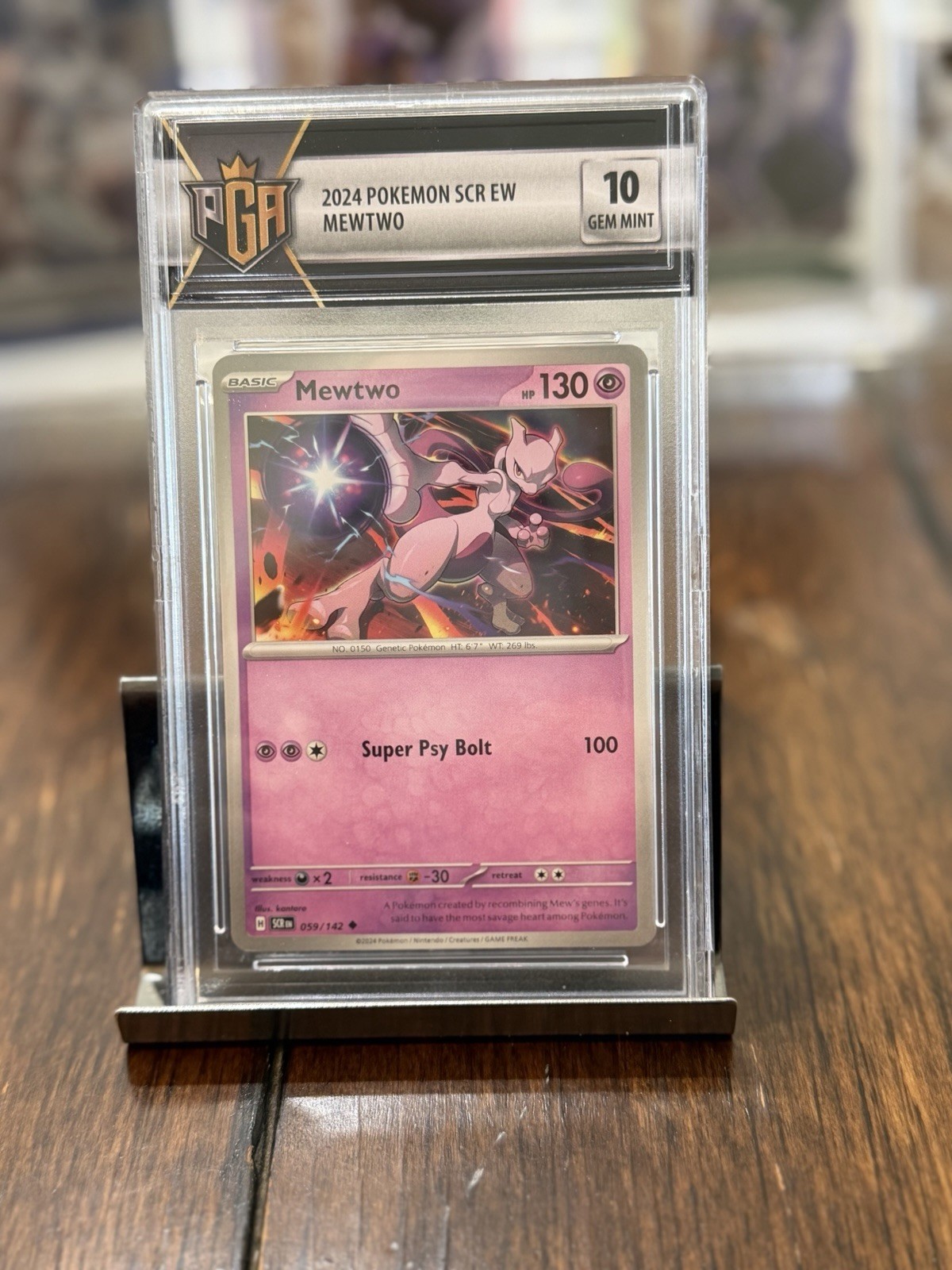The Pokémon Mewtwo 059/142 Sv07 Stellar Crown Holo English Graded 2024 PGA 10