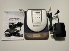 Sony D-E885 Discman ESP2 Portable CD Player with case, headphones, and charger